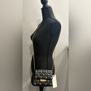 Ted Baker Ginn Crossbody Bag with Gold Rose Shape Accents in elegant black